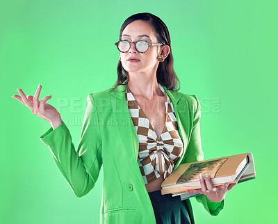 Buy stock photo Woman, books and teacher mockup in studio isolated on a green background. Gen z, education and smart female professor with product placement, advertising or marketing space while carrying textbooks.