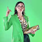 Woman, books and teacher pointing up in studio isolated on a green background. Gen z, education and emoji gesture of smart female educator carrying textbooks for learning, studying and knowledge.