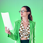 Fashion, paperwork and business woman isolated on green background for design career, gen z resume and internship. Young person or model with retro clothes and documents for job opportunity research