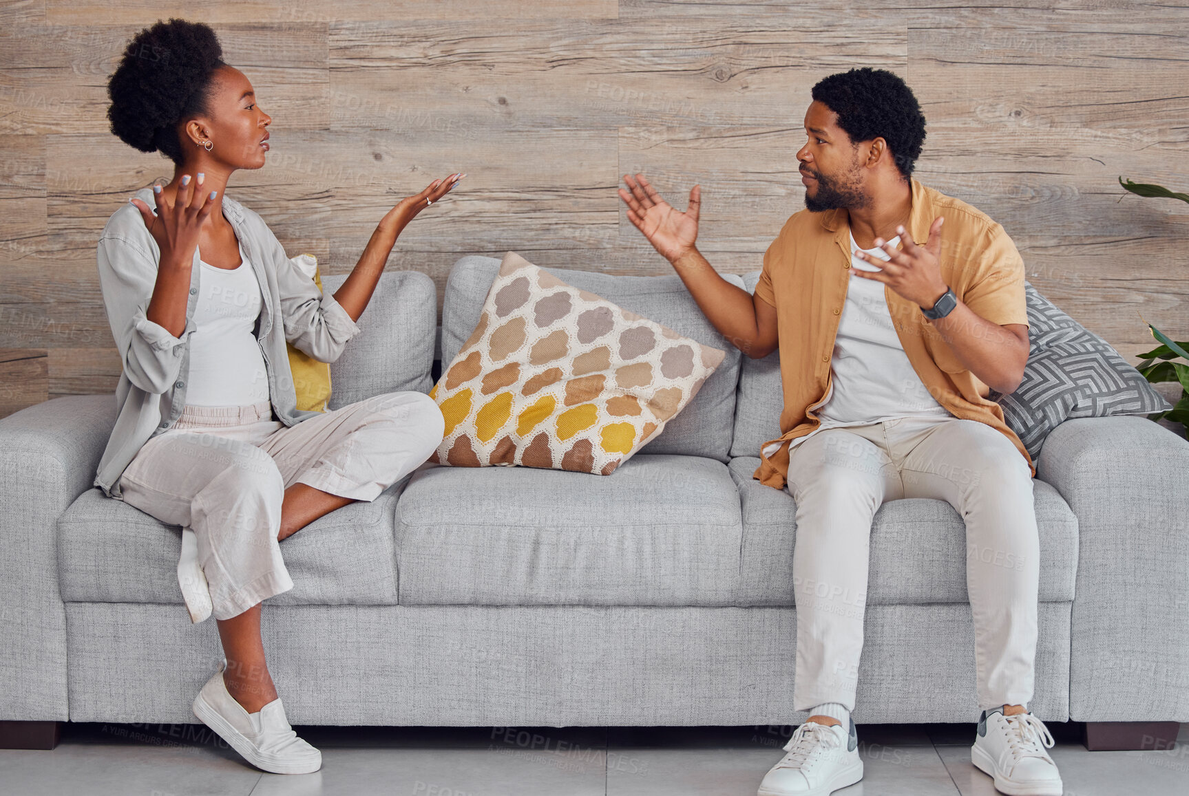 Buy stock photo Black couple, fight and angry on sofa for marriage problems, conflict and communication crisis. Divorce, argument and frustrated partner of man, woman and people in anger, affair or breakup in lounge