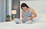 Pregnant stomach, woman and home bedroom while happy about bonding and growth. Mother to be person with hands on abdomen for healthy pregnancy development, body wellness and care or love on her bed