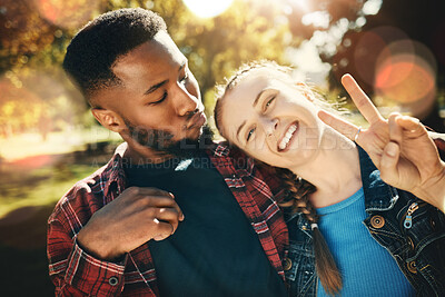 Buy stock photo Couple, selfie peace sign and portrait smile outdoors, enjoying fun time and bonding at park. Interracial, love romance and black man and woman with v hand emoji for taking pictures for happy memory.