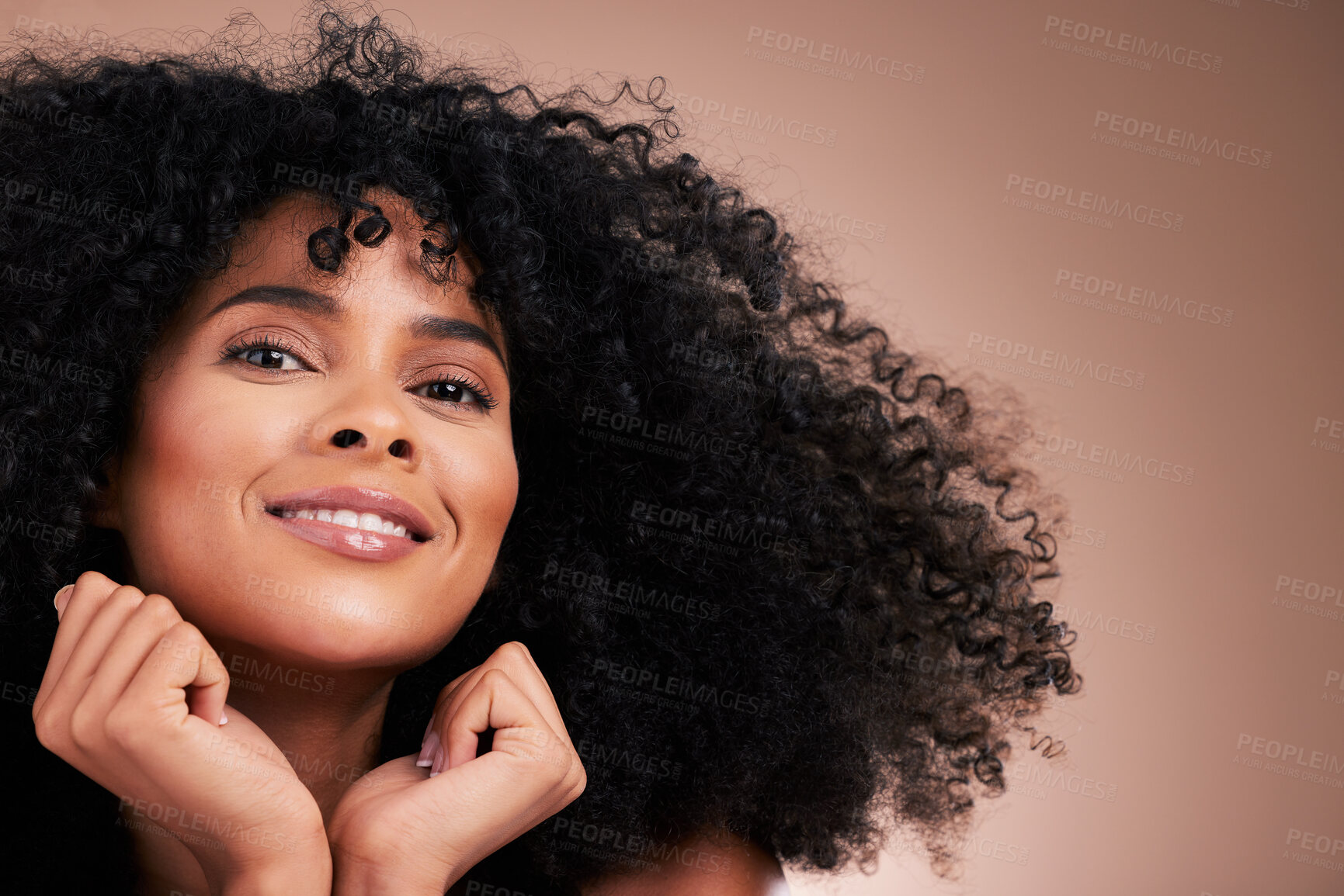 Buy stock photo Hair, beauty and portrait of black woman with smile on brown background for wellness, shine and natural glow. Salon, luxury treatment and happy girl face with curly hairstyle, texture and afro growth
