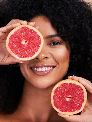 Buy stock photo Skincare, face and portrait of black woman with grapefruit in studio for health and dermatology. Fruit, wellness and smile of happy female model holding food for healthy diet, nutrition and vitamin c