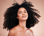 Hair care, beauty and portrait of black woman face in studio for shampoo growth and shine. Aesthetic model with natural curly afro for cosmetic, facial skincare and makeup glow on gradient background