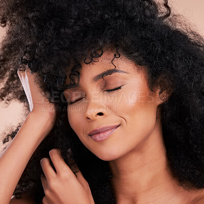 Buy stock photo Beauty, hair and skincare of black woman in studio for self care with shampoo and cosmetics. Face of aesthetic model person with natural afro and facial makeup glow or shine for health and wellness