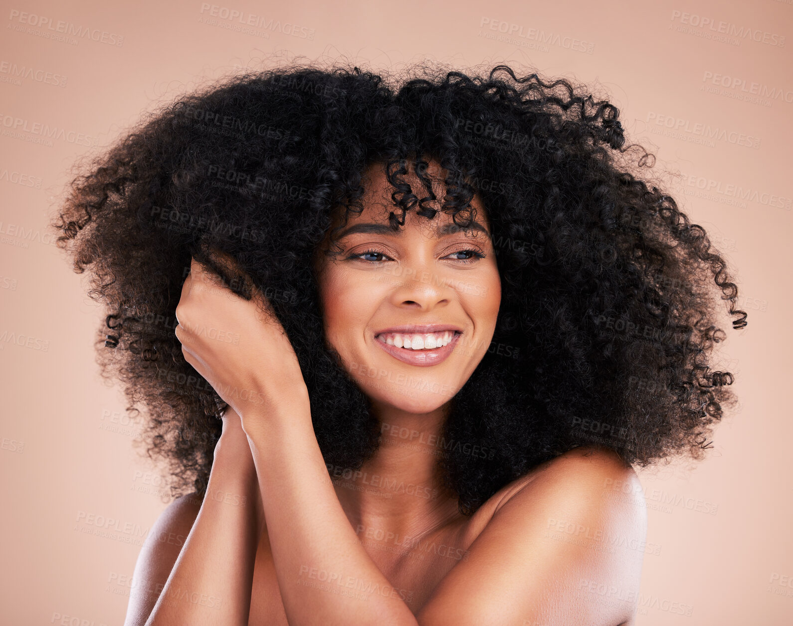 Buy stock photo Curly hair texture, black woman and makeup of a young model with a healthy afro from salon treatment. Happy face, cosmetics and African person with wellness, skincare and smile from beauty in studio