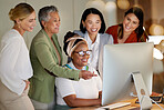 Collaboration, management and a business woman with her team, laughing while working on a computer in the office. Teamwork, diversity and coaching with a senior female manager training staff at work