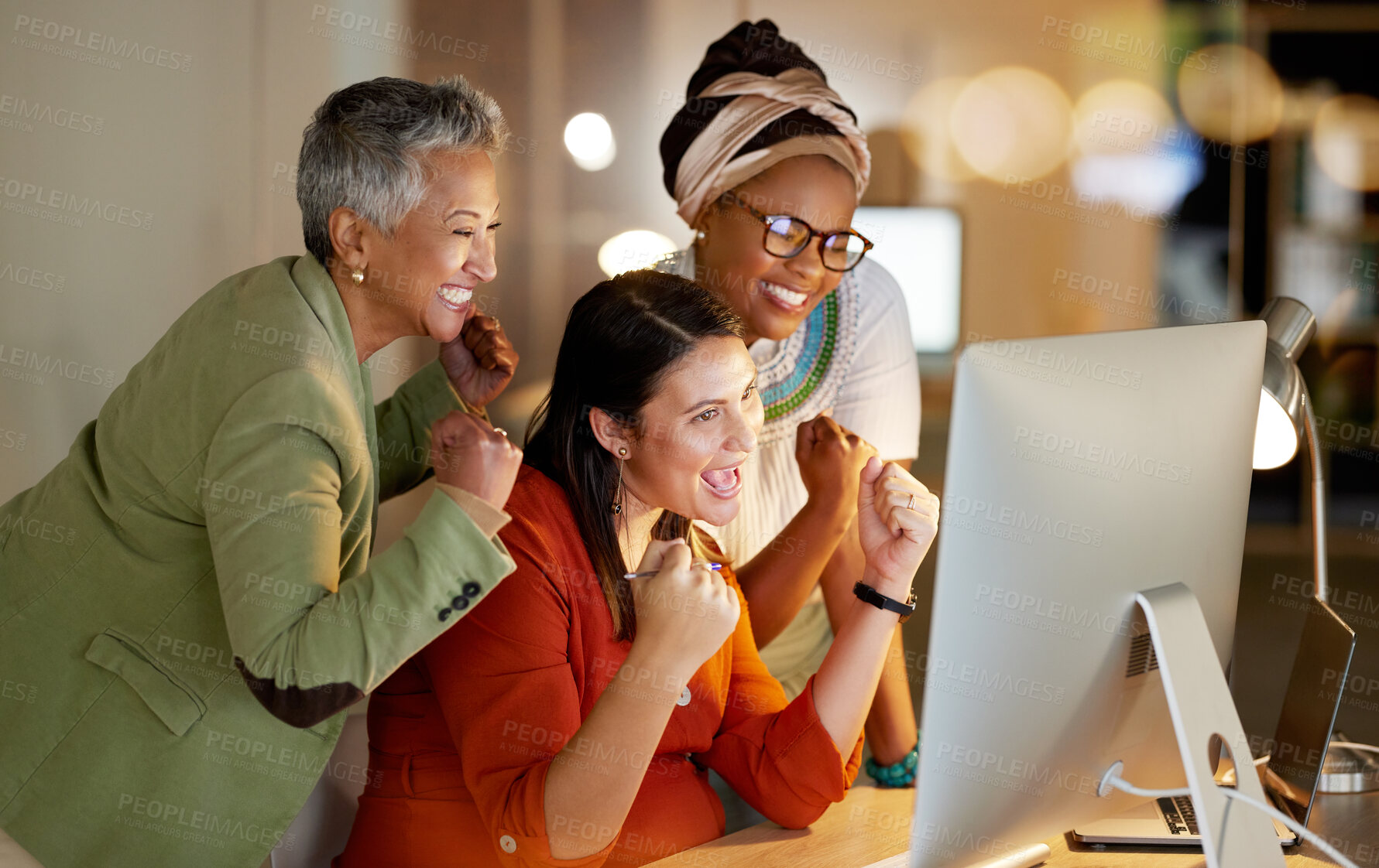 Buy stock photo Creative business people, computer and celebration for winning, good news or team promotion at office desk. Group of women designers smile celebrating bonus, win or teamwork success by PC in startup