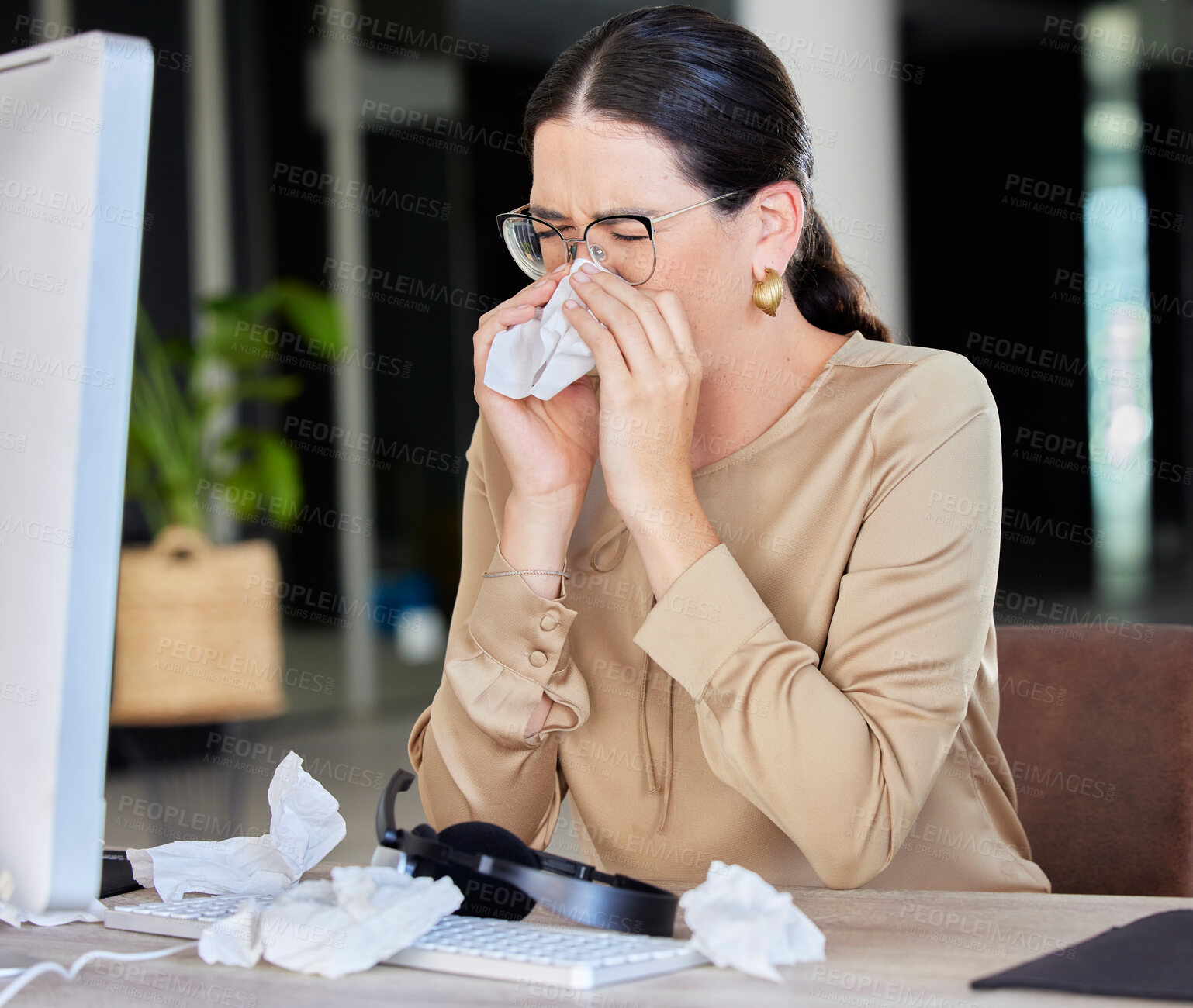 Buy stock photo Call center, woman and tissue at office, sick and sneezing by computer, headphones and microphone. Contact us, toilet paper and customer service expert with flu, covid and self care in workplace