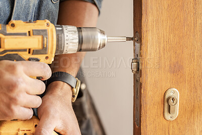 Buy stock photo Handyman, drill door and wood for handle at workplace, industry and home development goals. Hands, tools and construction worker with maintenance, property management and diy carpenter for building