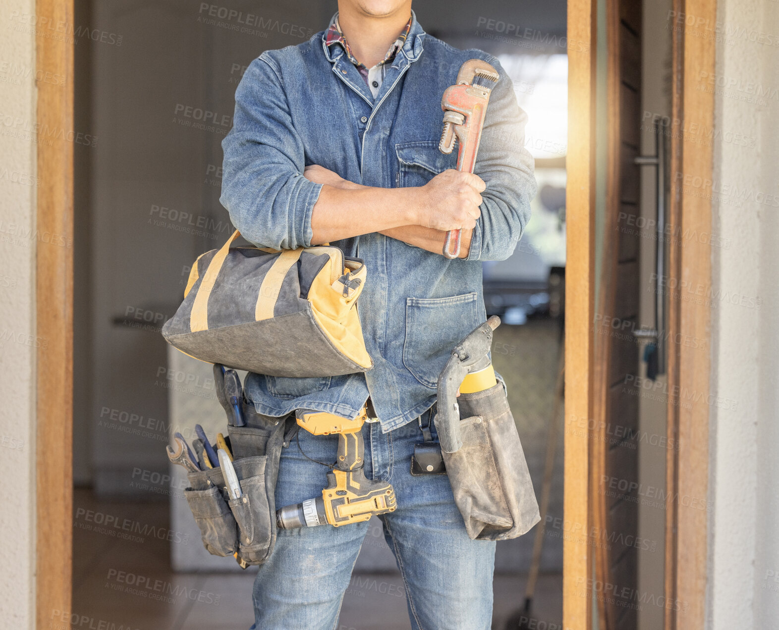 Buy stock photo Handyman, tool bag and arms crossed at work with goals, property development and real estate maintenance. Construction worker, tools and renovation industry with service, vision and home improvement