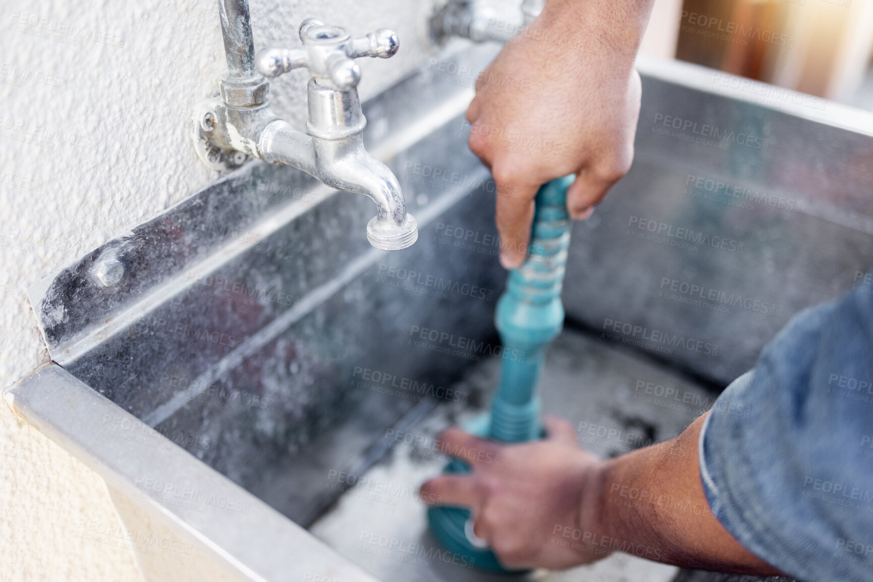 Buy stock photo Plumber, drain and man with plunger for sink, maintenance and repairs, blockage or cleaning. Plumbing, drainage and professional handyman fixing, clear and working with equipment for system fix