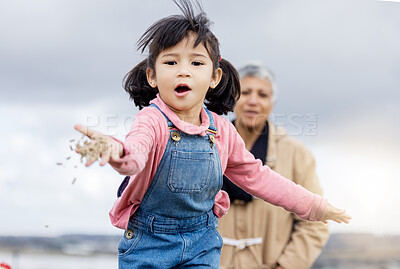 Buy stock photo Portrait, children and farm with an asian girl feeding livestock outdoor for agriculture or sustainability. Food, nature and kids with a female child in the countryside to feed in the countryside