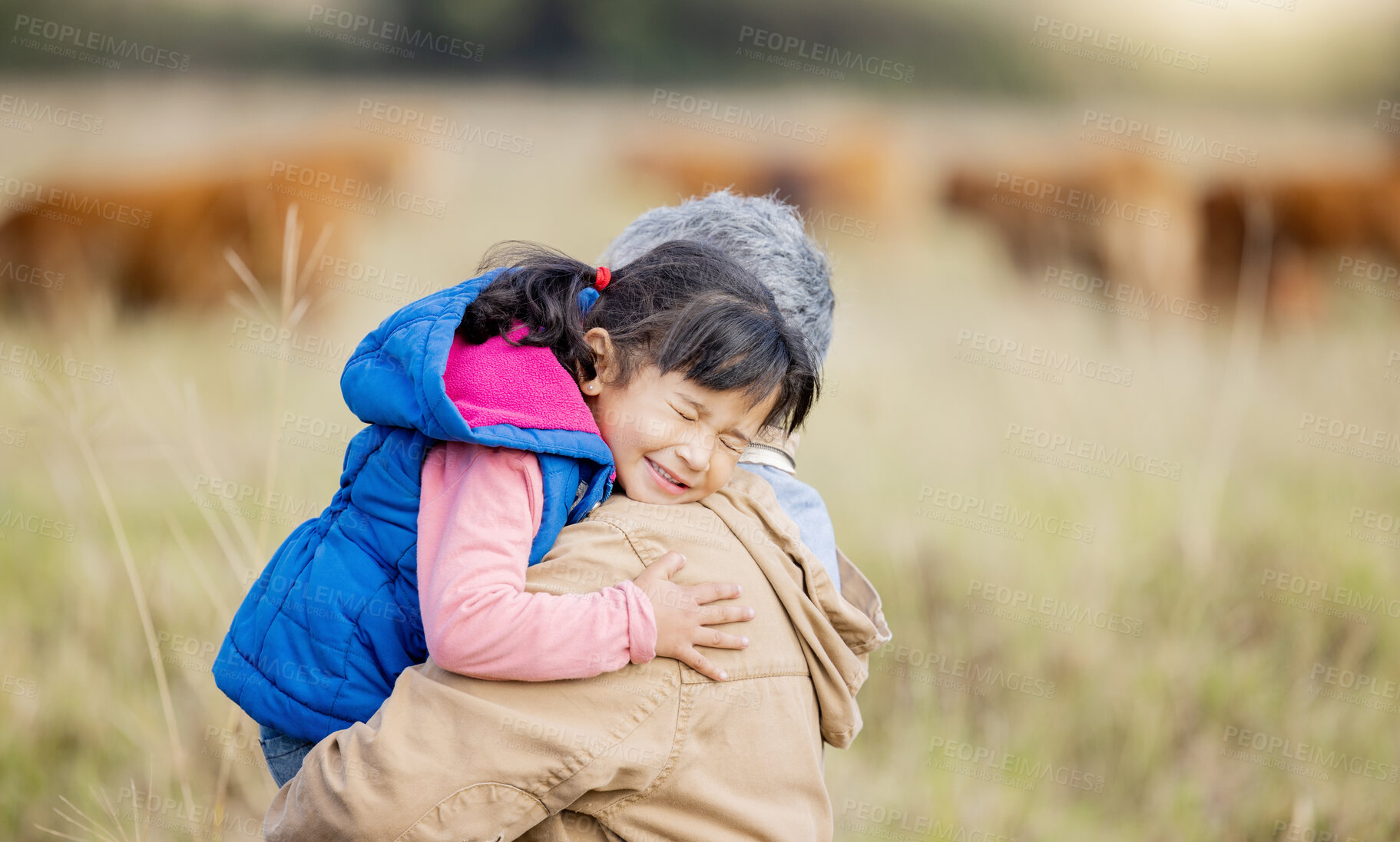 Buy stock photo Grandmother, happy hug and girl on nature walk with senior woman in the countryside. Outdoor field, grass and elderly female with child on a family adventure on vacation with happiness and fun 