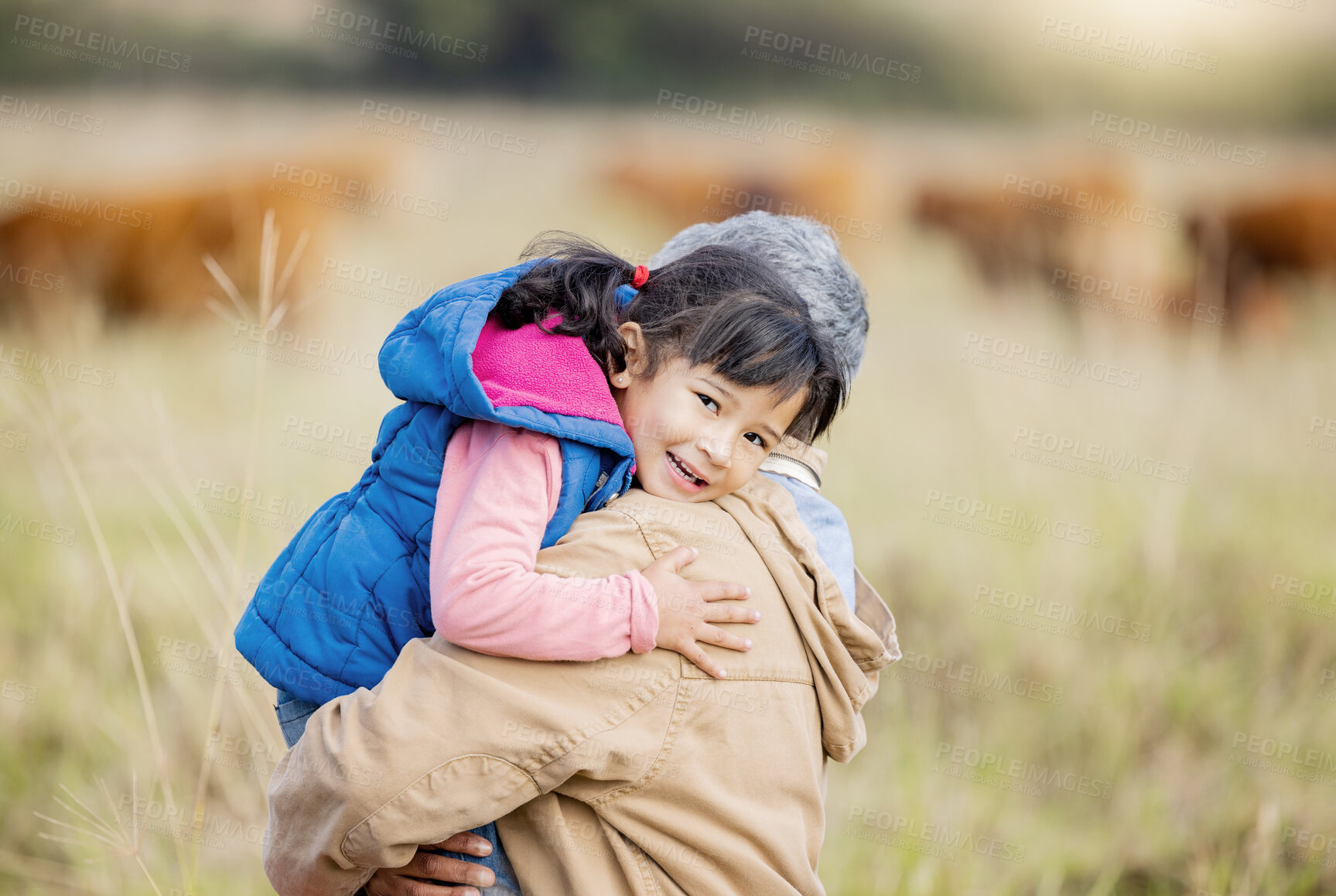 Buy stock photo Grandmother carrying girl, field portrait and family farm, grass and bonding together with love outdoor. Old woman, child and hug support in countryside, care and happiness in nature with landscape