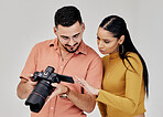 Teamwork, photographer and startup with camera in studio for shoot, magazine project or online content review. Digital agency, collaboration or people working on marketing or advertising campaign