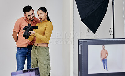 Buy stock photo Teamwork, photographer and startup people with camera in studio set for shoot, magazine project or online content. Planning, focus or girl examine picture for digital catalog or fashion web design