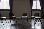 Group therapy, mental health or circle chairs in empty room, clinic or asylum building for trauma, ptsd or anxiety counselling. Furniture, support or community psychology counseling for help meeting