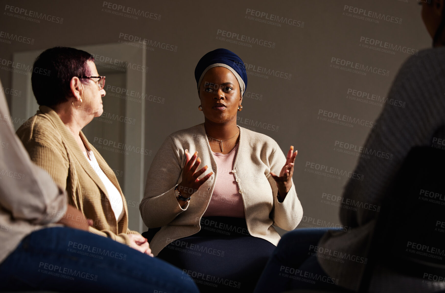 Buy stock photo Support, black woman and senior group therapy with understanding, feelings and talking in session. Mental health, grief or depression, people in retirement with therapist sitting together for healing