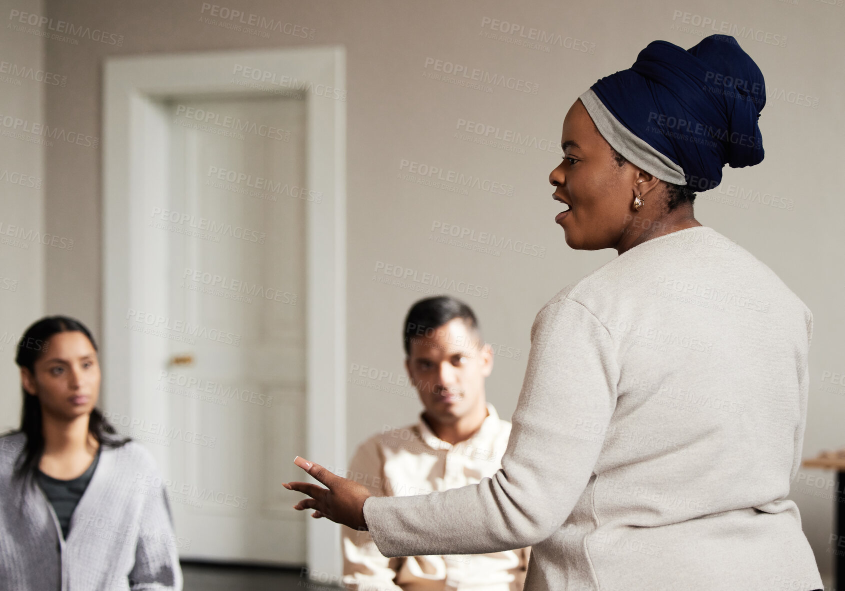 Buy stock photo Talking, black woman and group of people in therapy with understanding, sharing feelings and psychology session. Mental health, addiction or depression, men and women with therapist sitting together.