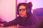 Video games, young girl and headset in home for esports, online rpg and virtual competition. Female gamer, computer streamer and gaming with headphones in neon lighting, live streaming tech and gen z