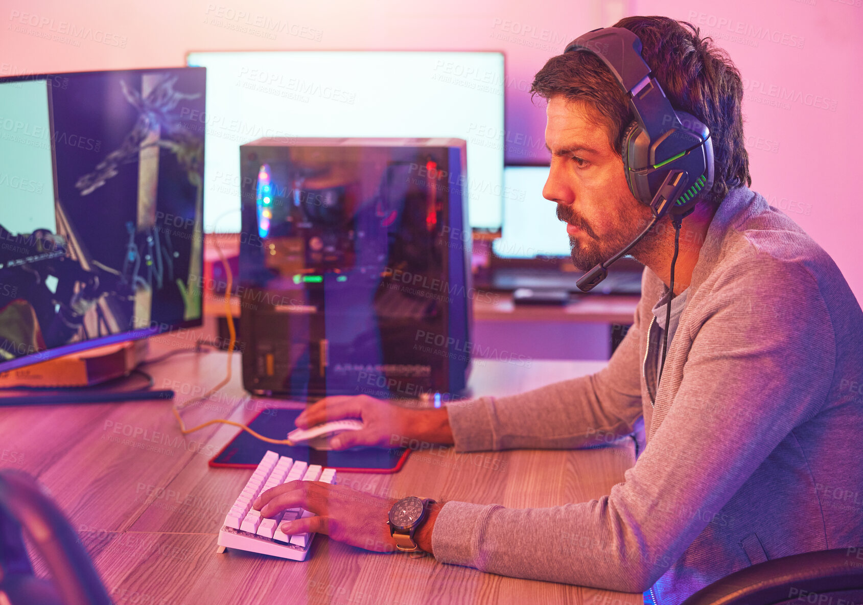 Buy stock photo Computer gamer, man and headphones for esports, online games and virtual competition in dark room. Gaming guy, rpg player and video game on headset in neon lighting, pc technology and cyber internet