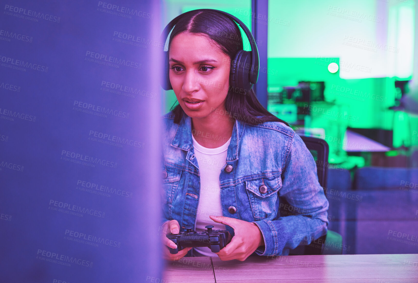 Buy stock photo Gamer, headphones and woman on computer in home at night in green neon light for web esports. Gaming, technology and female with controller playing online games, multiplayer or video game in house.