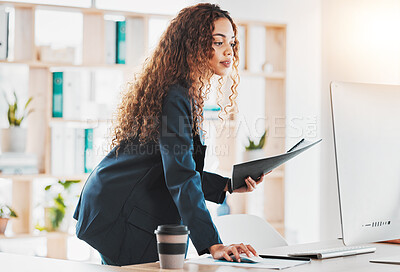 Buy stock photo Businesswoman, computer and document in schedule planning, preparation or strategy standing at office desk. Female employee manager checking desktop PC in analysis or project plan at the workplace