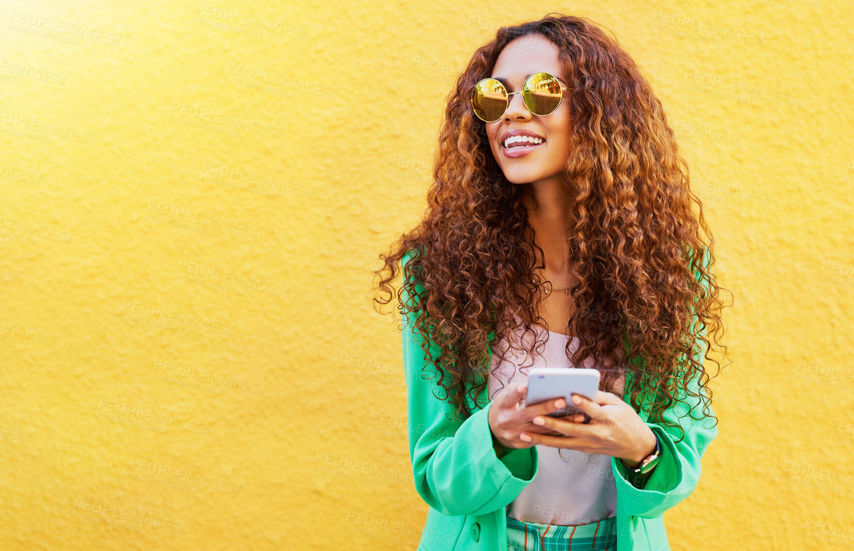 Buy stock photo Fashion, phone and black woman isolated on wall background for social media, blog or creative ideas mockup. Funky model or thinking person on mobile app or smartphone with designer summer clothes