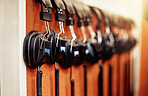 Music, equipment and headphones on display at a studio for production, streaming and radio broadcast. Sound, headset and devices displayed for listening to a track, audio or record for entertainment
