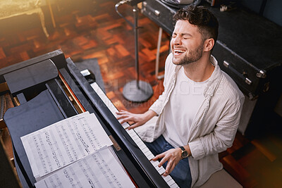 Buy stock photo Top view, piano and man singing, creative and training for performance, show or talent. Male artist with skills, recording studio or singer with keyboard, vocal practice or playing musical instrument