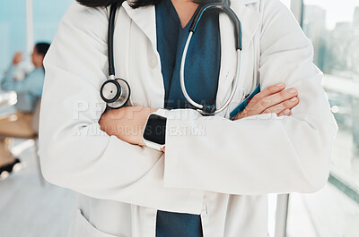 Buy stock photo Doctor, hands and arms crossed with stethoscope for healthcare cardiology or life insurance at hospital. Closeup hand of confident medical expert, professional or specialist standing ready at clinic