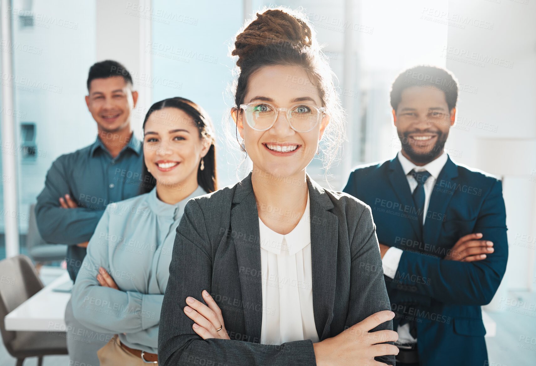 Buy stock photo Portrait, collaboration and leadership with a manager woman and her team standing arms crossed in the office. Vision, teamwork or diversity and a female leader posing at work with her employee group