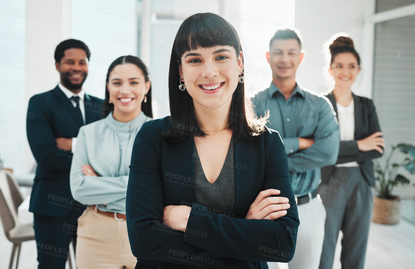 Buy stock photo Portrait, collaboration and leader with a manager woman and her team standing arms crossed in the office. Vision, teamwork or diversity and a female manager posing at work with her employee group