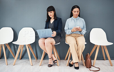 Buy stock photo Waiting room, interview and women ready for hiring meeting with laptop and phone in office building. People, employee and worker preparing for business internship or job opportunity or employment