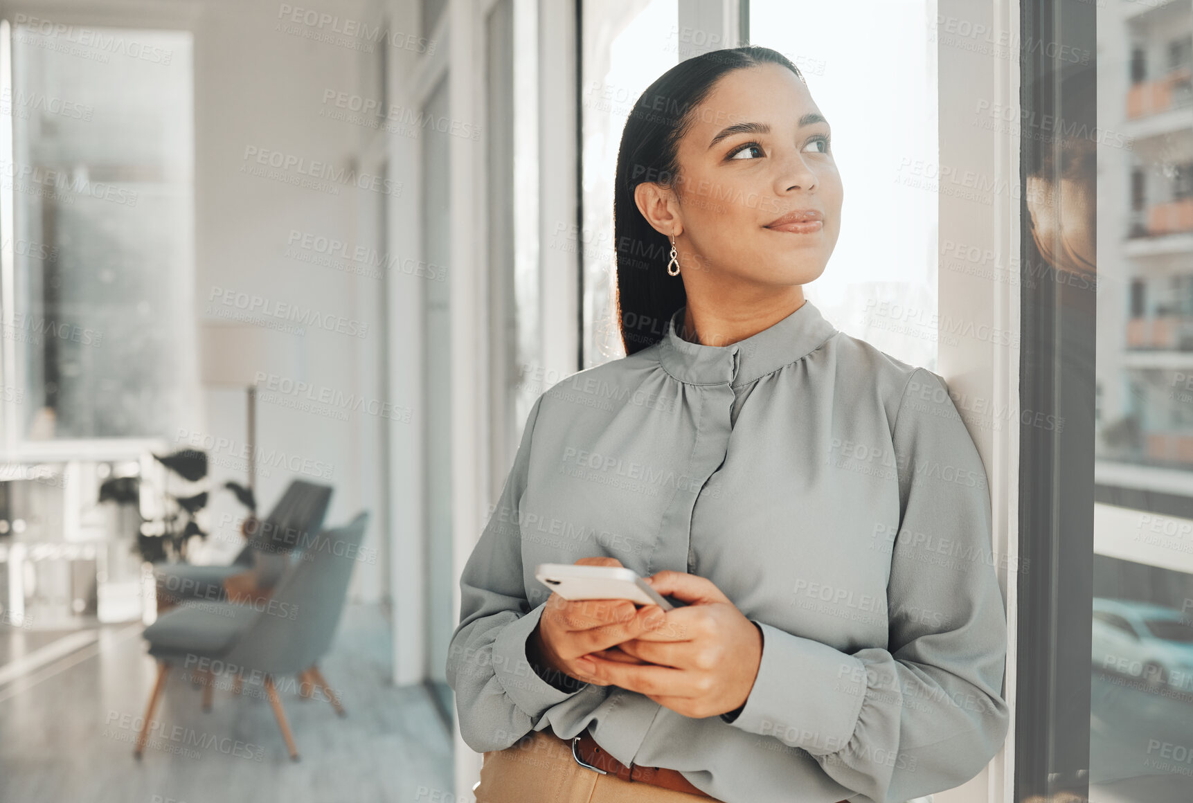 Buy stock photo Business woman smile, thinking and phone in a corporate law firm with lawyer ideas for work. Modern office, Indian female and mobile of a employee with workplace vision and entrepreneur idea