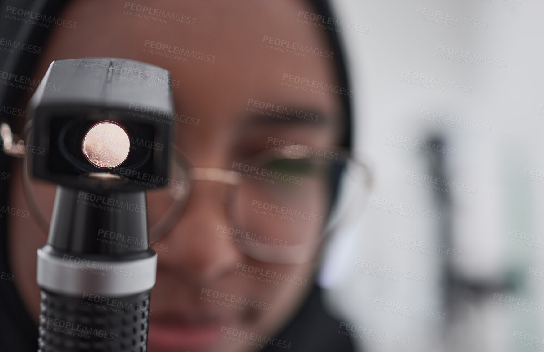 Buy stock photo Eye exam, consulting and medical with muslim woman optometry tool for healthcare, vision and microscope for you. Ophthalmology, wellness and glaucoma test with girl and retinoscope for treatment