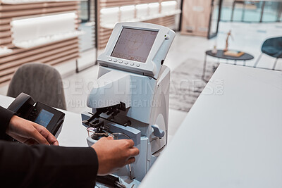 Buy stock photo Optical lens machine, working optometrist and glasses construction of a healthcare worker. Vision assessment tools, wellness and medic employee planning a optometry project for medical work 