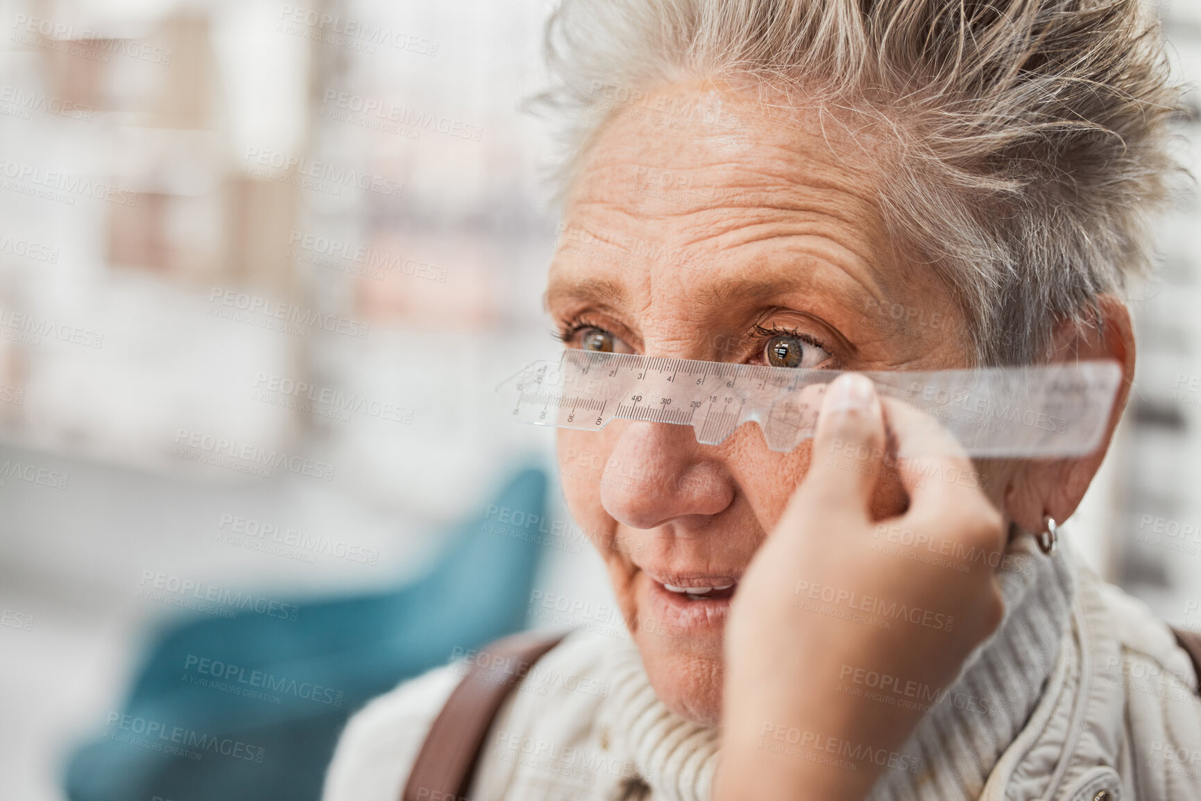 Buy stock photo Optometry, ruler and doctor measuring eyes of a woman for glasses, frame fitting and eye distance. Healthcare, medical and mature patient with an optometrist to measure vision, lens and eyesight