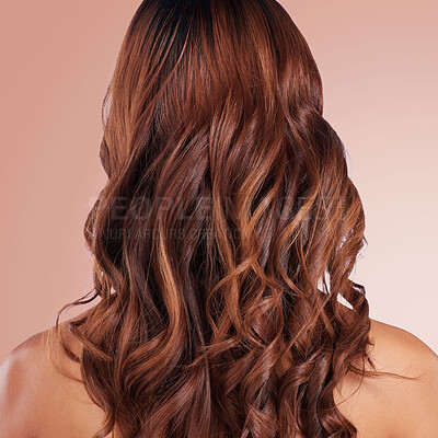 Buy stock photo Beauty, back and hair care of woman in studio isolated on a red background for haircare. Curly hairstyle, keratin cosmetics and female model with salon treatment for growth, texture and balayage.
