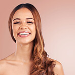 Portrait, skincare and hair with a model black woman in studio on a pink background for natural haircare. Face, beauty and keratin with an attractive young female feeling proud of her hairstyle