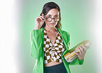 Education, university and portrait of a woman with books isolated on green background in a studio. Smart, professor and teacher with glasses and notebook for learning, class and studying on backdrop