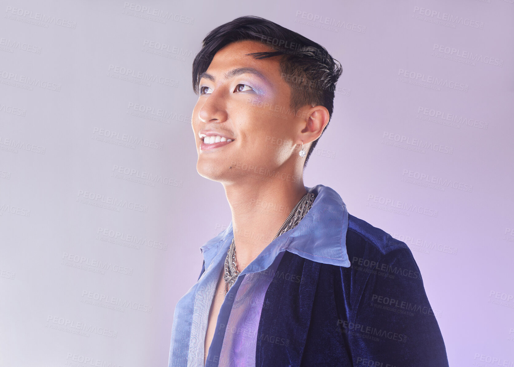 Buy stock photo Makeup, smile and fashion, lgbt man from Indonesia with confidence isolated on purple background. Happy, aesthetic and male model with beauty in studio, creative non binary and gender neutral design.