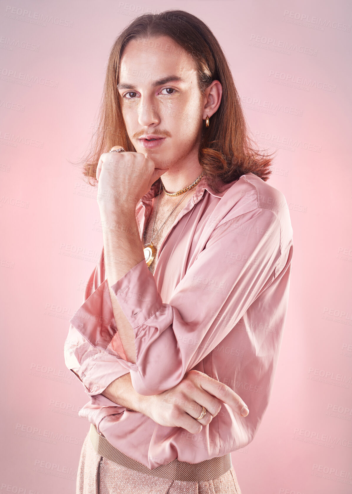 Buy stock photo Portrait, retro fashion and lgbt man, pride and confidence isolated on pink background. Style, aesthetic and art, gay male model in beauty and creative non binary and gender neutral design in studio.