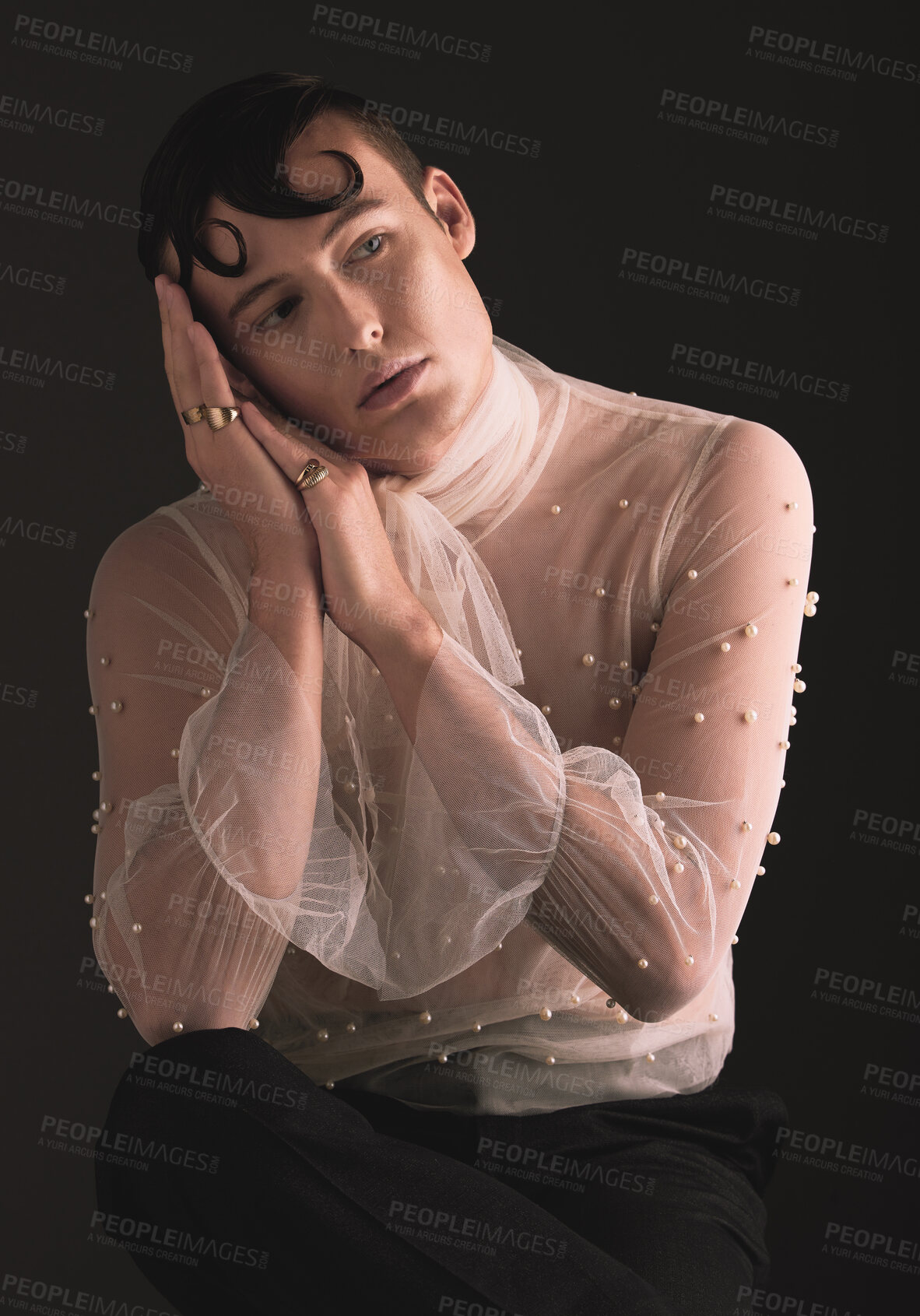 Buy stock photo Gender neutral, fashion and Victorian aesthetic with designer clothing and faux pearls in studio. Isolated, black background and lgbtq or gay model with jewelry and creativity and non binary art