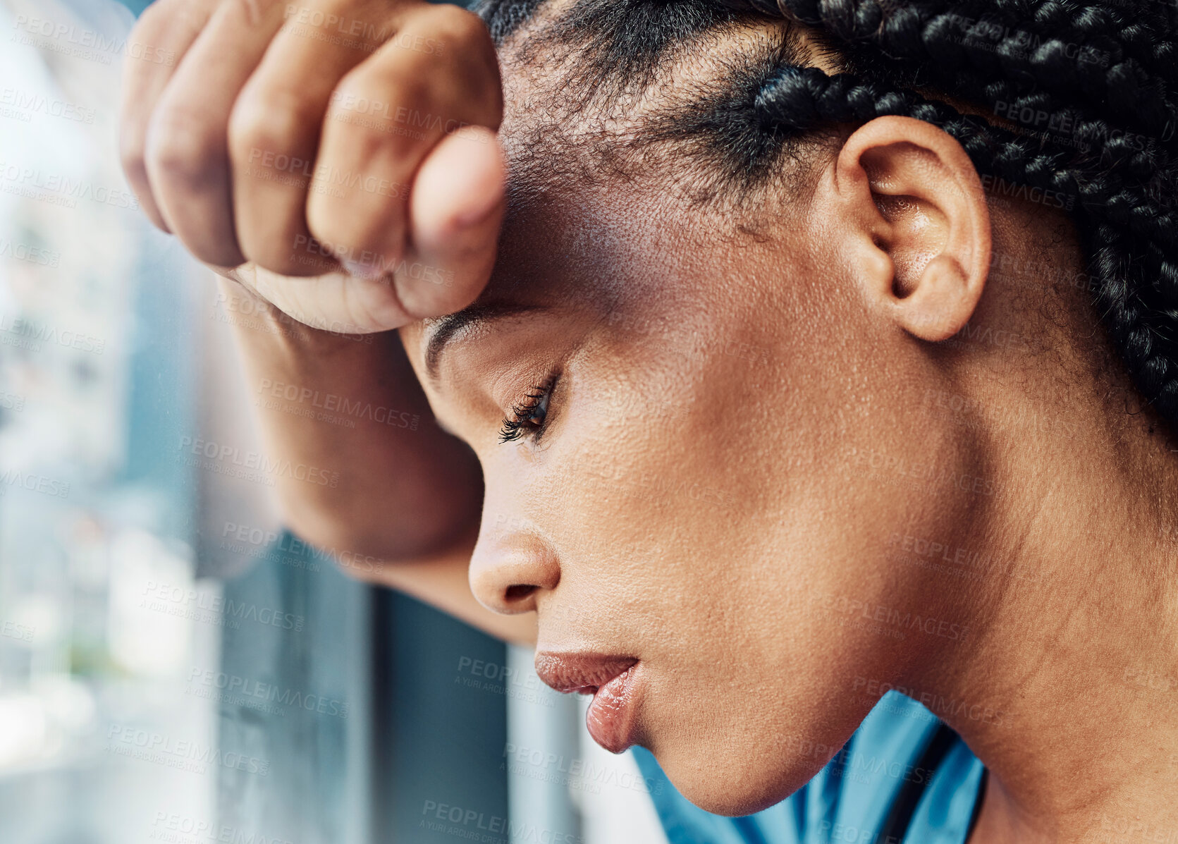 Buy stock photo Doctor, black woman burnout and anxiety in hospital, workplace and tired in healthcare job, stress or headache. Nurse, sad and exhausted in medical clinic or depression in health hospital by window