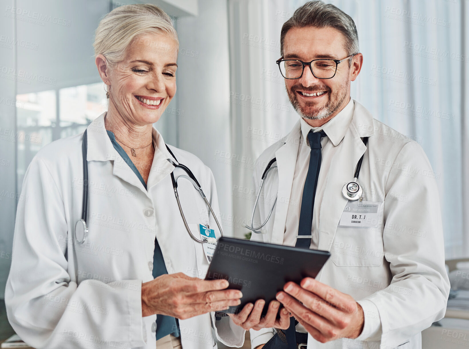 Buy stock photo Doctor, teamwork or tablet in hospital for healthcare, planning report and medical innovation. Medicine, vision or health experts collaboration with woman and man consulting online treatment research