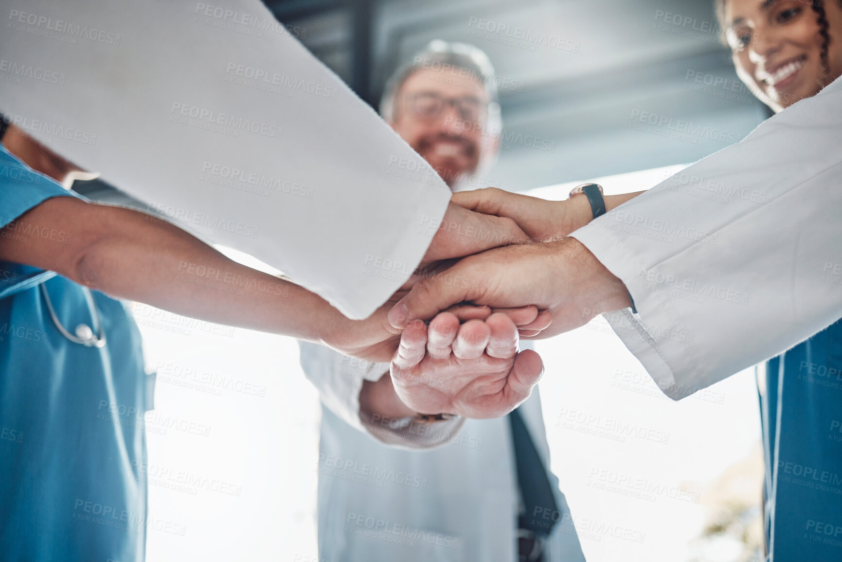 Buy stock photo Doctor, team and hands together in healthcare agreement, trust or partnership for success or unity at clinic. Group of medical experts piling hand in teamwork collaboration, achievement or goals