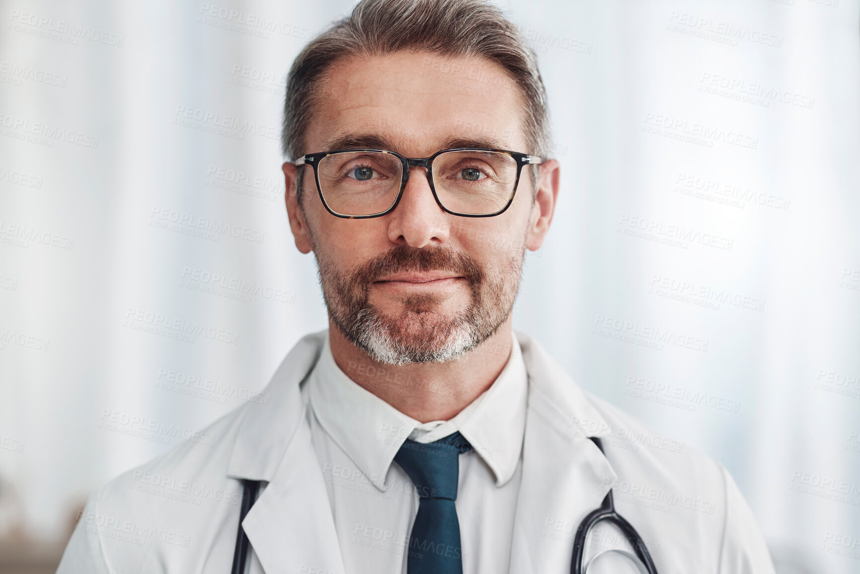 Buy stock photo Healthcare, leadership and portrait of mature doctor, man in hospital for support, pride and help in medical work. Health, wellness and medicine, confident professional with stethoscope and smile.